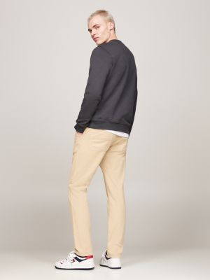 zwart sweatshirt met ronde hals en tommy-badge voor heren - tommy jeans