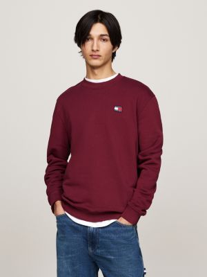 red tommy badge crew neck sweatshirt for men tommy jeans