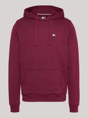 felpa con cappuccio e distintivo tommy rosso da uomini tommy jeans