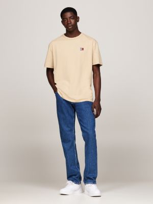 t-shirt con distintivo tommy sul petto beige da uomini tommy jeans