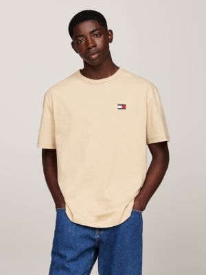 beige tommy badge crew neck t-shirt for men tommy jeans