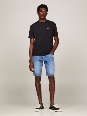 t-shirt con distintivo tommy sul petto nero da uomini tommy jeans