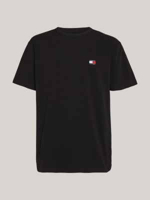 t-shirt con distintivo tommy sul petto nero da uomini tommy jeans