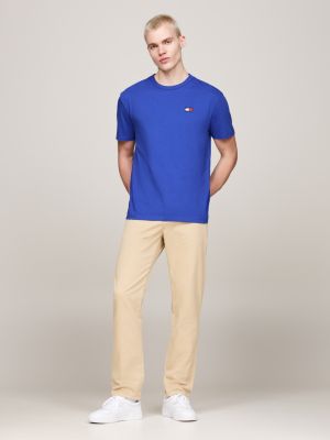 t-shirt con distintivo tommy sul petto blu da uomini tommy jeans