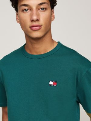 t-shirt con distintivo tommy sul petto blu da uomini tommy jeans