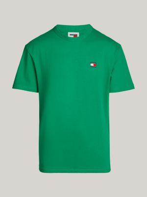 t-shirt con distintivo tommy sul petto verde da uomini tommy jeans