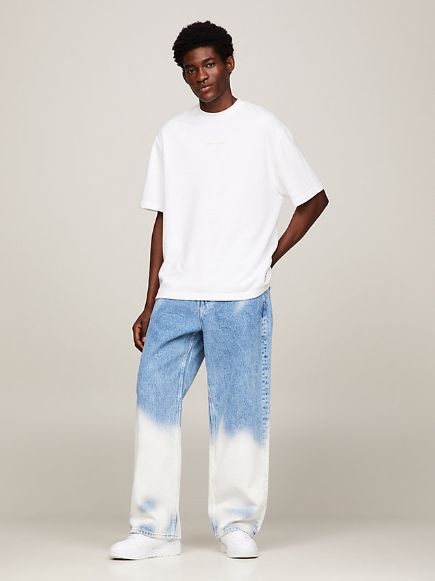 denim genderneutrale weite jeans mit bleach-wash für herren - tommy jeans