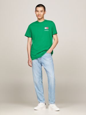 t-shirt essential slim fit con logo verde da uomini tommy jeans