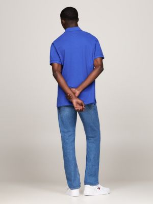blau regular fit poloshirt mit badge für herren - tommy jeans