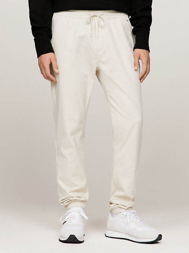 beige austin peached twill slim fit joggers for men tommy jeans
