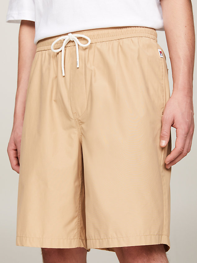 beige aiden baggy fit casual shorts for men tommy jeans