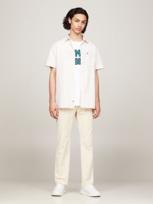 beige ryan weite hose mit stückfärbung für herren - tommy jeans