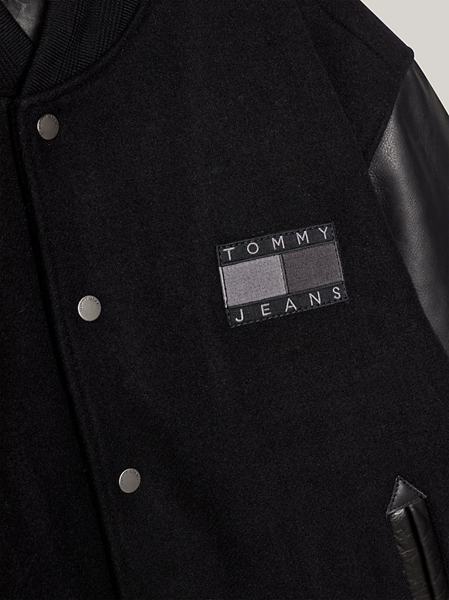black tommy remastered dual gender varsity jacket for men tommy jeans