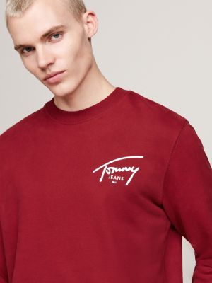 felpa con logo firma grafico sul retro rosso da uomini tommy jeans