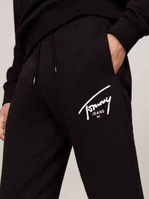 black signature logo cuffed slim joggers for men tommy jeans