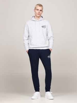 blau slim fit jogginghose mit bündchen und logo für herren - tommy jeans