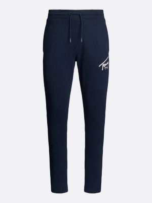 blue signature logo cuffed slim joggers for men tommy jeans