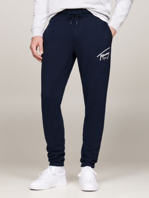 blue signature logo cuffed slim joggers for men tommy jeans