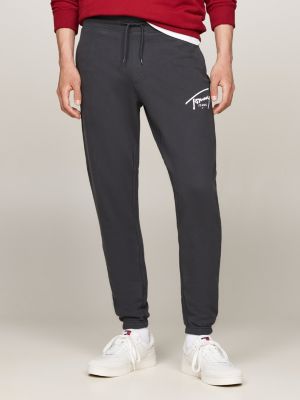 grey signature logo cuffed slim joggers for men tommy jeans