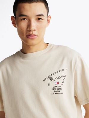 t-shirt con logo firma sul retro bianco da uomini tommy jeans