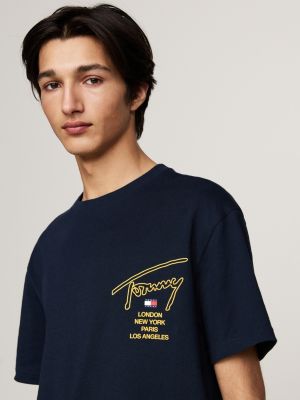 camiseta con logo con la firma en la espalda azul de hombres tommy jeans