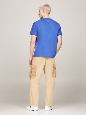 t-shirt varsity con effetto sbiadito e logo blu da uomini tommy jeans