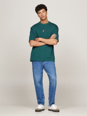 groen oversized t-shirt met tommy-badge voor heren - tommy jeans