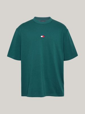 groen oversized t-shirt met tommy-badge voor heren - tommy jeans