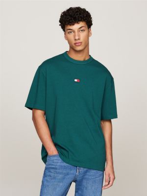 t-shirt oversize tommy badge vert pour hommes tommy jeans