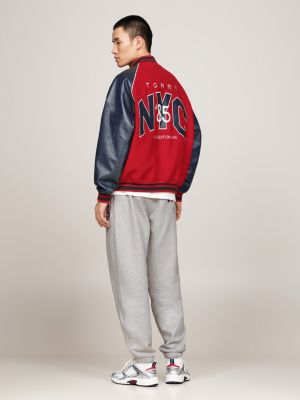 giacca varsity tj x game day con logo sul retro rosso da uomini tommy jeans