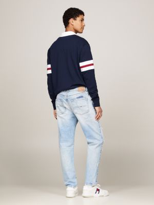 jeans distressed isaac relaxed fit affusolati sbiaditi blu da uomini tommy jeans