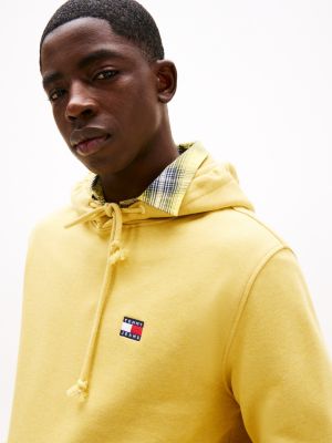 sweat à capuche avec badge tommy jaune pour hommes tommy jeans