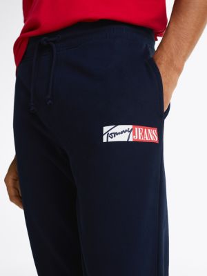 blue signature logo cuffed slim joggers for men tommy jeans