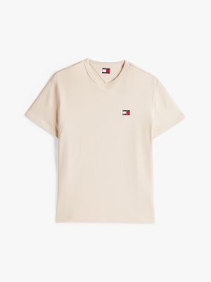 beige tommy badge crew neck t-shirt for men tommy jeans