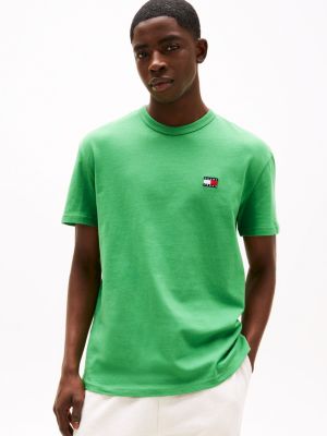 t-shirt con distintivo tommy green da uomini tommy jeans