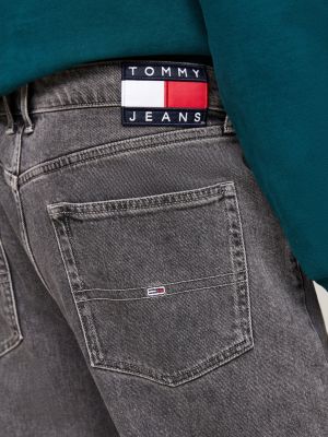 vaqueros isaac amplios con pernera cónica y efecto desteñido gris de hombres tommy jeans