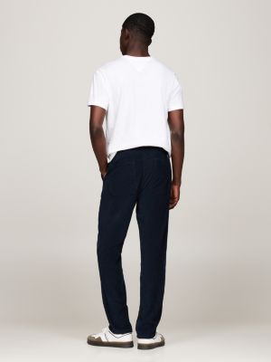 pantalón chino ryan de pana teñido en prenda azul de hombres tommy jeans