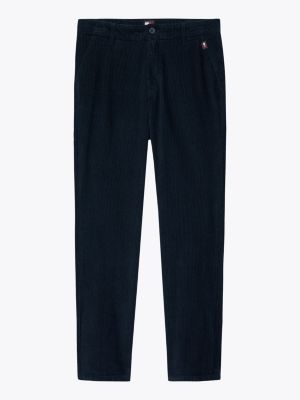 pantalón chino ryan de pana teñido en prenda azul de hombres tommy jeans