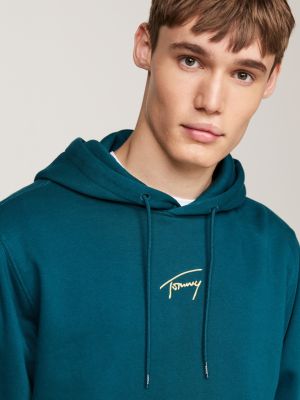 felpa con cappuccio e logo firma dorato verde da uomini tommy jeans