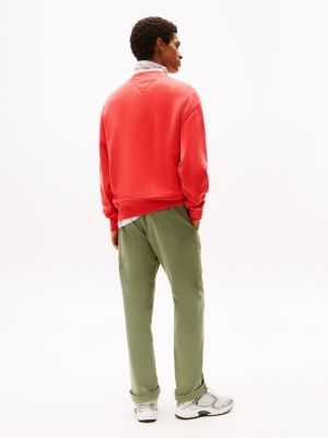 orange relaxed fit sweatshirt met badge voor heren - tommy jeans