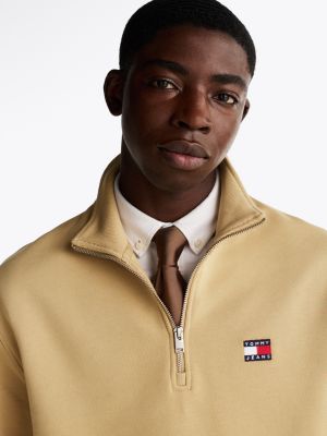 beige tommy badge half-zip sweatshirt for men tommy jeans