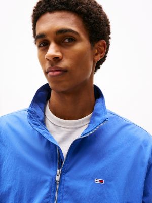 blauw lichtgewicht windbreaker met tunnelkraag voor heren - tommy jeans