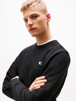 zwart terry sweatshirt met tommy-badge voor heren - tommy jeans