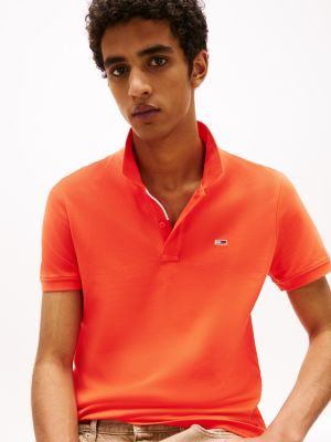 orange slim fit poloshirt mit flag-patch für herren - tommy jeans