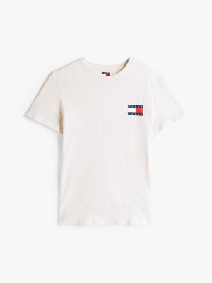 t-shirt ajusté tommy badge beige pour hommes tommy jeans