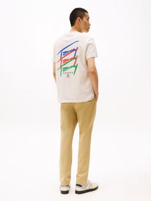 beige t-shirt mit grafik-logo hinten für herren - tommy jeans