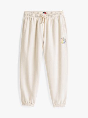 beige varsity logo relaxed joggers for men tommy jeans