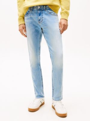 blau austin slim jeans mit tapered leg und fade-effekt für herren - tommy jeans