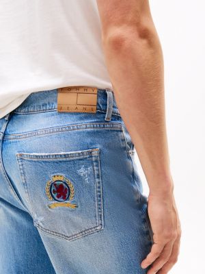 jean ample à blason brodé bleu pour hommes tommy jeans