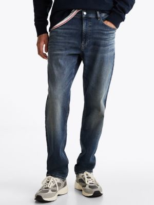 vaqueros ryan rectos de corte ajustado y efecto desteñido azul de hombres tommy jeans